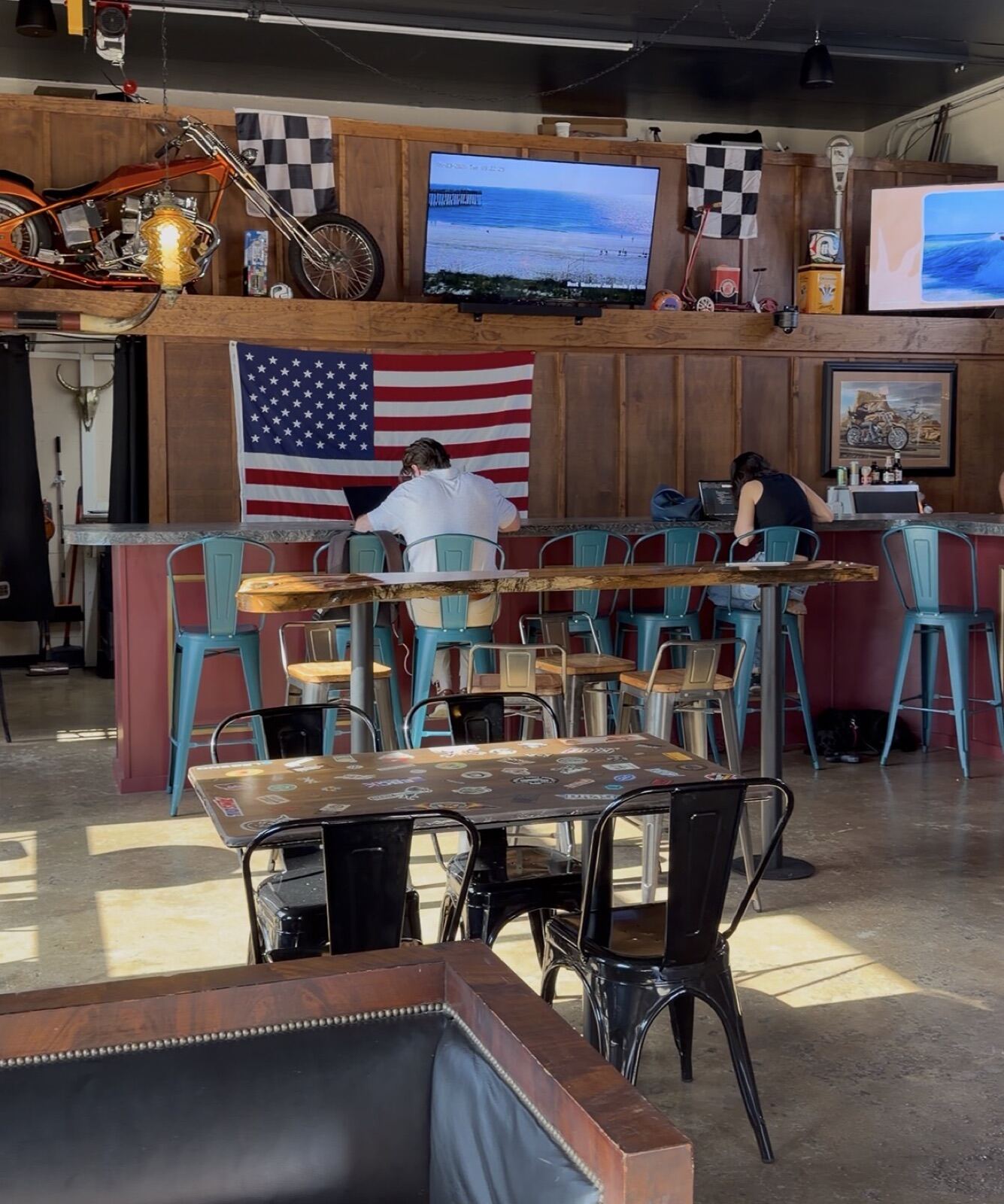 Inside The Corner Station coffee shop in Jacksonville Beach with vintage motorcycle decor